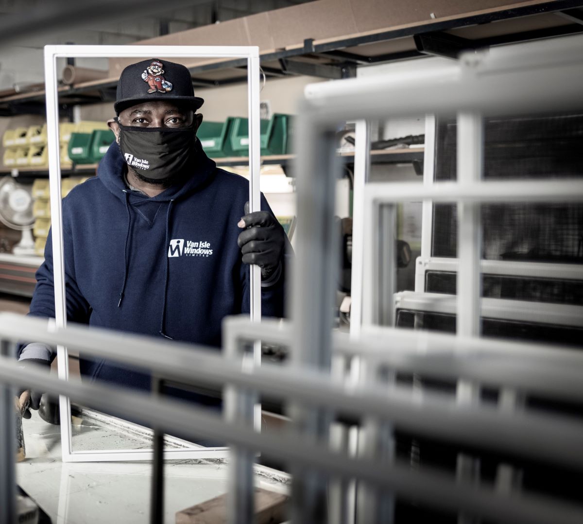 employee at window manufacturing facility