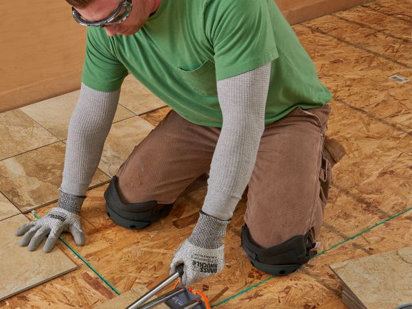 floor installation with kneepads