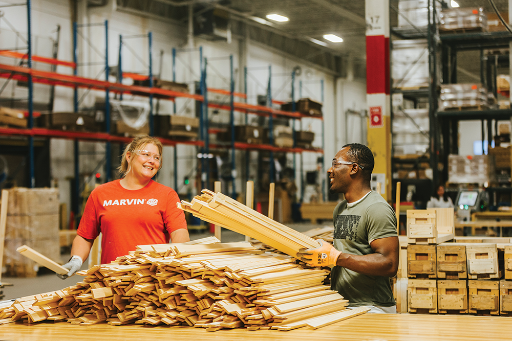 employees on window manufacturing floor