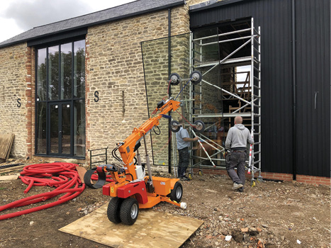 glass-lifting equipment on jobsite