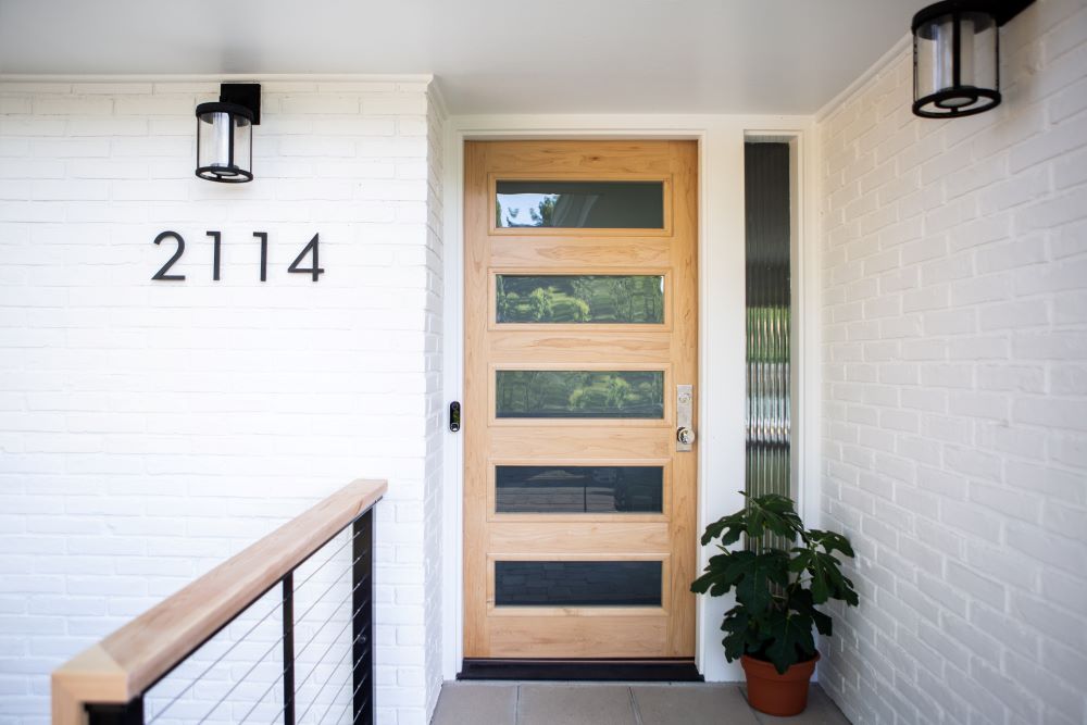 ranch house with new entry door