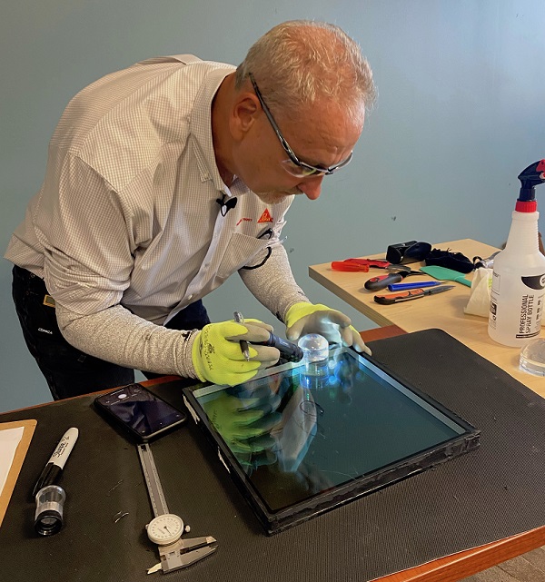 Jim Blamble of Sika Corp performs a forensic evaluation on an IG unit