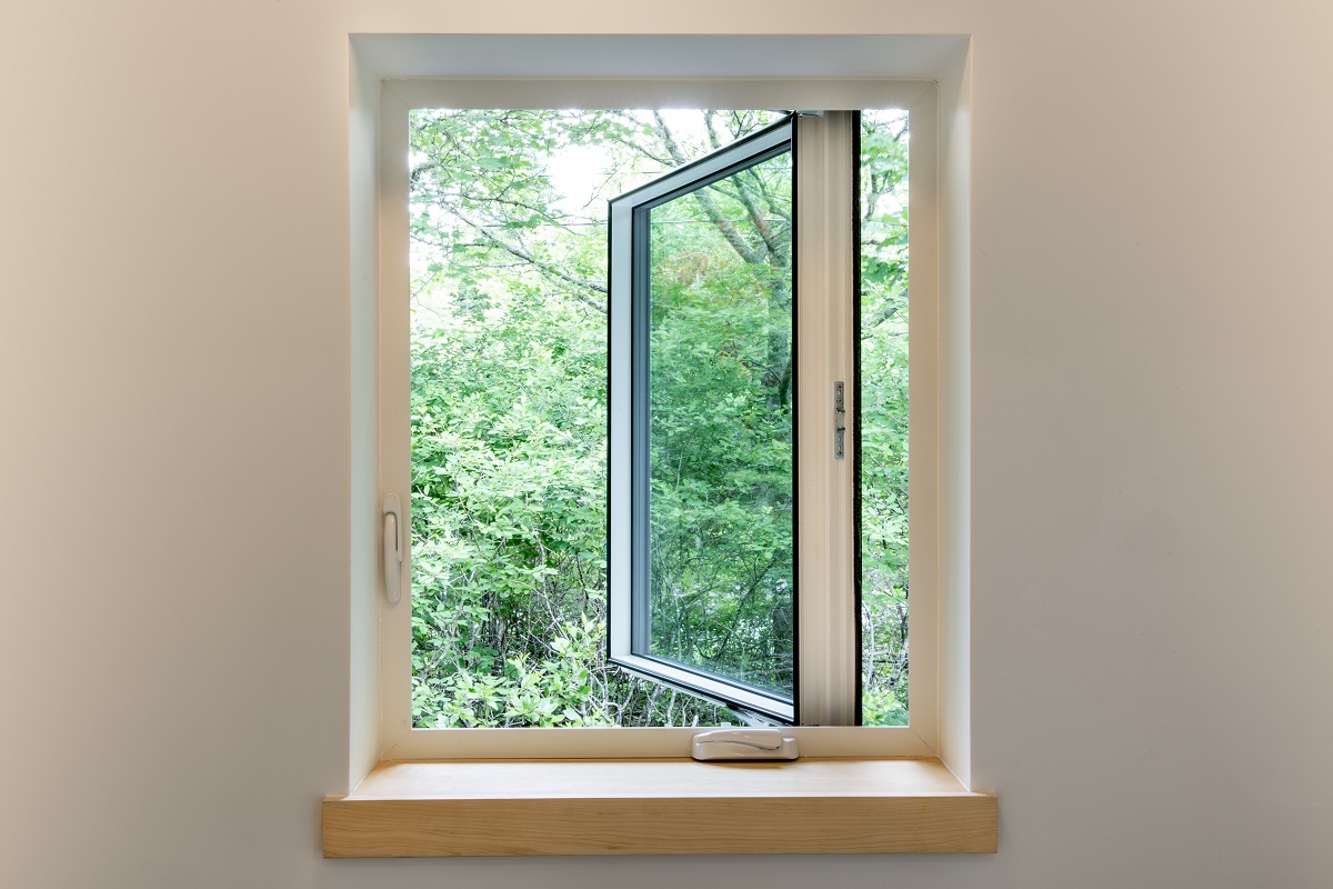 looking through an open casement window outdoors