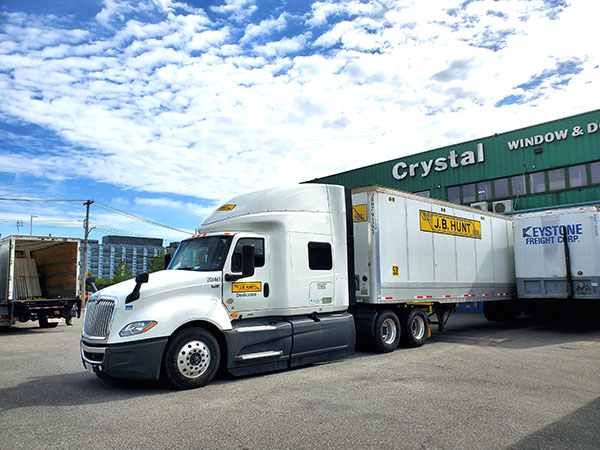 Crystal Window & Door Systems expanded its delivery fleet with dedicated service by JB Hunt to enhance customer deliveries and service.