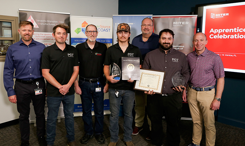 MITER Brands employees celebrate Clark