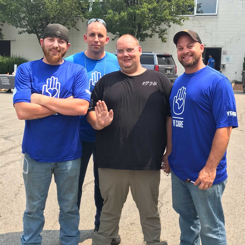 Veka employees at a service event