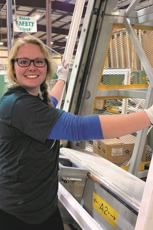 female employee at window factory