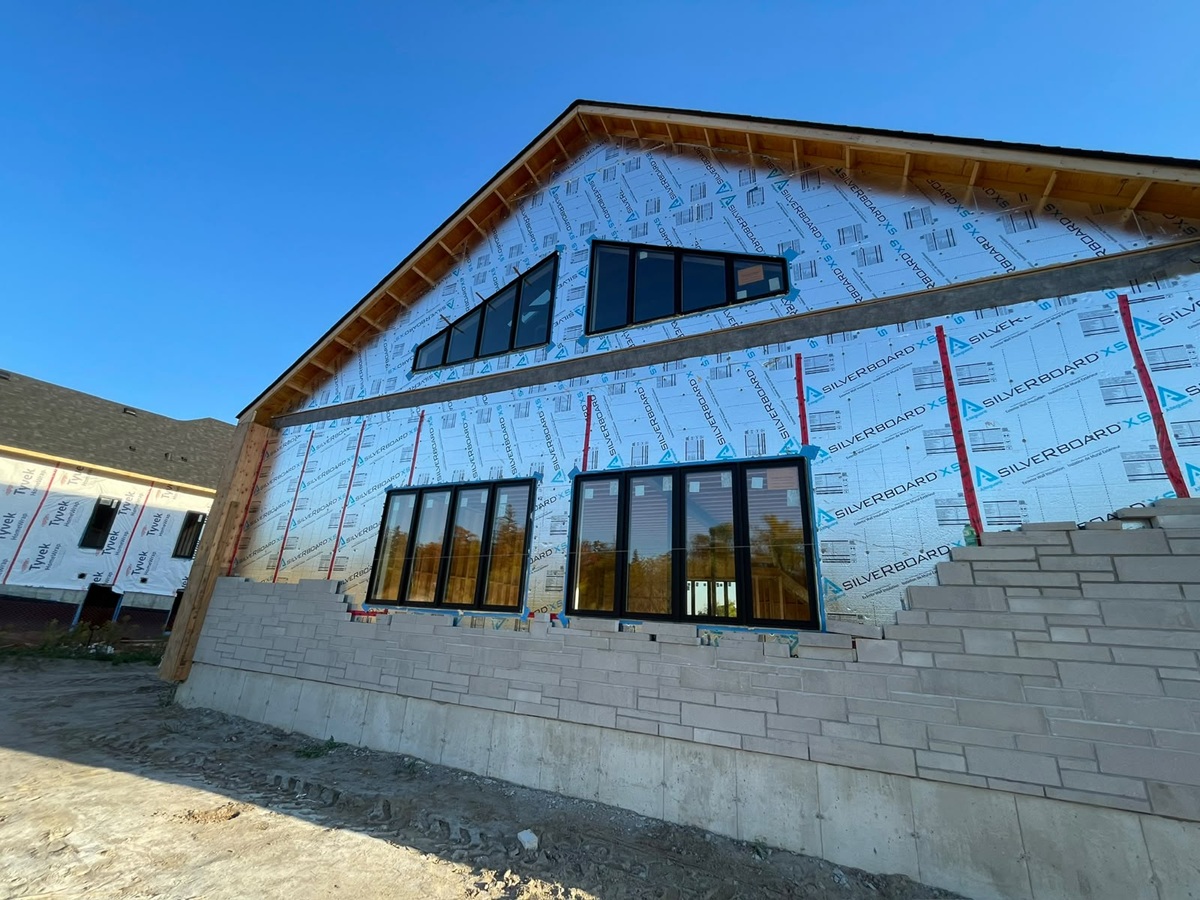 Perimeter flashing and air barrier detail on a Toronto installation