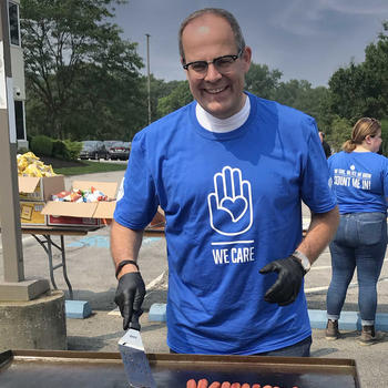 employee grilling during safety day