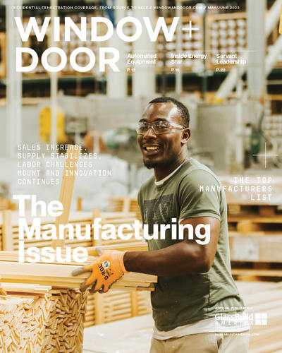 a worker moves pieces of lumber at Marvin Windows and Doors plant on the cover the the May/June issue of Window and Door