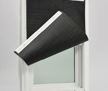 Window with storm protection system