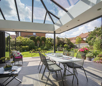 Patio with two fold-away window walls