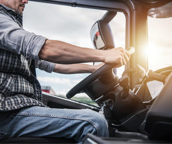 truck driver at steering whell