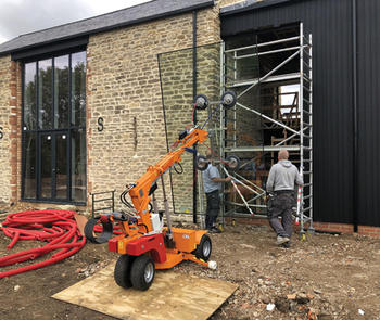 glass-lifting equipment on jobsite