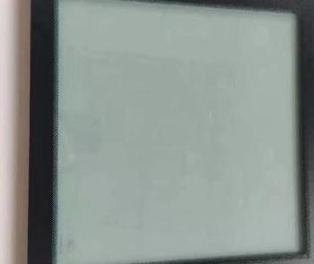 Vacuum insulating glass